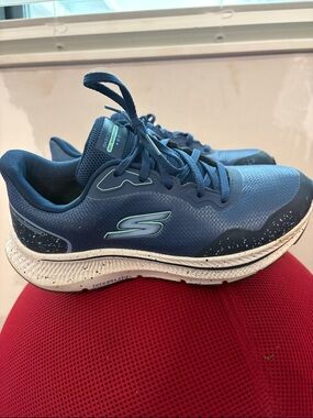 Skechers women’s  Navy Blue Athletic Running Shoes with Light Green Accents